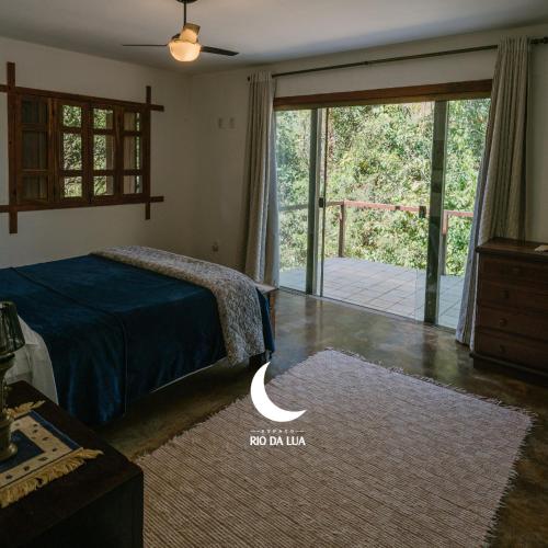 Кровать или кровати в номере Espaço Rio da Lua - Casas - Cipó, Mata, Madeira e Tororão - São Jorge GO