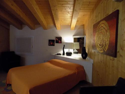 A bed or beds in a room at Hotel Residence Sole
