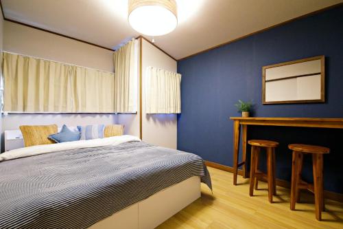 Katil atau katil-katil dalam bilik di -Takaya house- Minamirokugou close Haneda AP