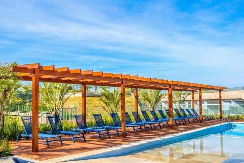Bazén v ubytování Resort frente ao mar apto 1222 DNA Praia Grande nebo v jeho okolí