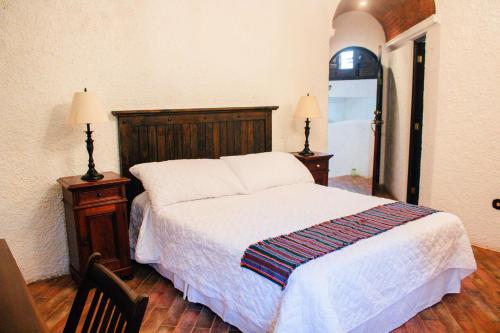 Postel nebo postele na pokoji v ubytování Finca Ana Isabel