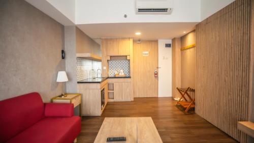 Η κουζίνα ή μικρή κουζίνα στο Bigland Bogor Hotel Powered by Archipelago