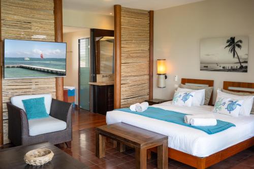 Postel nebo postele na pokoji v ubytování Emeraude Villas - Bay