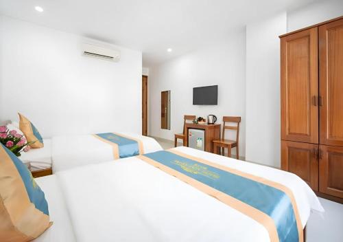 Voodi või voodid majutusasutuse Mặt Trời Tím Hotel & Spa toas