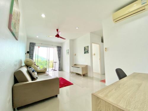 Ruang duduk di Chalong - 8 Bedroom Private Pool Villa - Nap Crown
