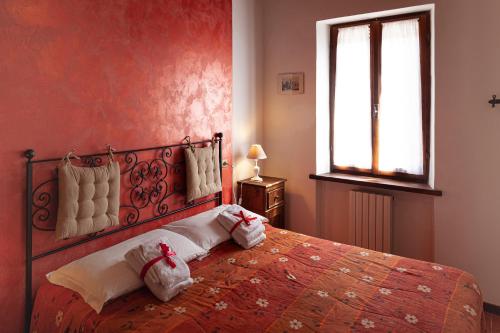 Ένα ή περισσότερα κρεβάτια σε δωμάτιο στο Agriturismo Collelignani