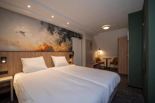 Katil atau katil-katil dalam bilik di Fletcher Hotel Restaurant Rooland