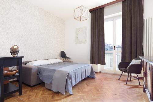 A bed or beds in a room at Casa di Crissy - centro Como