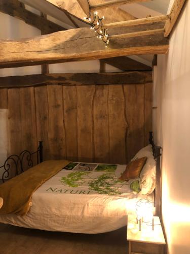 מיטה או מיטות בחדר ב-L'AUBERGE DES PYRENEES