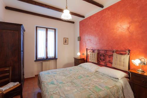 Ένα ή περισσότερα κρεβάτια σε δωμάτιο στο Agriturismo Collelignani