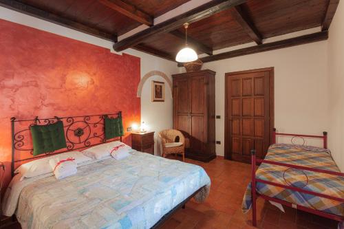 Ένα ή περισσότερα κρεβάτια σε δωμάτιο στο Agriturismo Collelignani