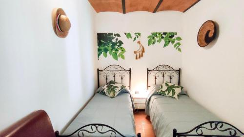 Habitación con 2 camas en una habitación en Villa Daya by BarbarHouse, en Carignano