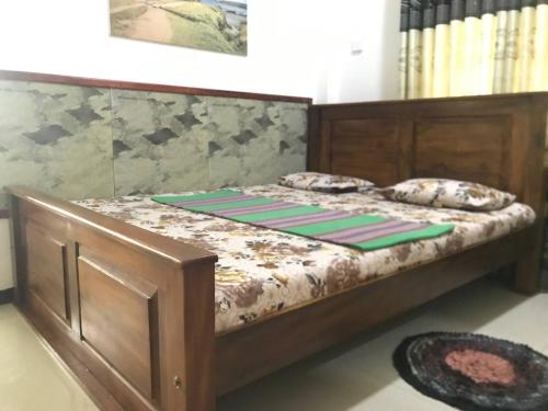 Katil atau katil-katil dalam bilik di Bundala Swan cottages