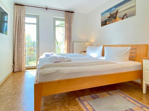 Postel nebo postele na pokoji v ubytování Residenz Bleichröder - Ferienwohnung 28