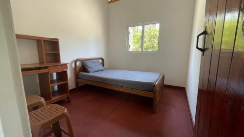 Voodi või voodid majutusasutuse Cabin Unambuwa toas