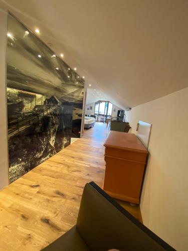 an office with a large painting on the wall at Schwarzes Rössl in St. Wolfgang