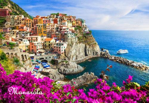 a view of a town on the side of a mountain at Rachele Guest House La Spezia in La Spezia