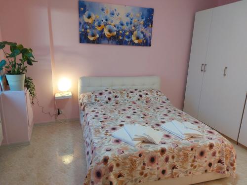 Postel nebo postele na pokoji v ubytování SWEETY LELE HOUSE