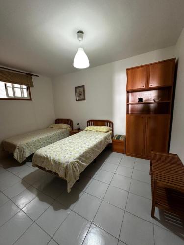 Postel nebo postele na pokoji v ubytování APARTAMENTOS BALCON DEL SOL en Puntallana