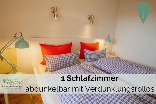 Postel nebo postele na pokoji v ubytování Friesenherz - Memmert