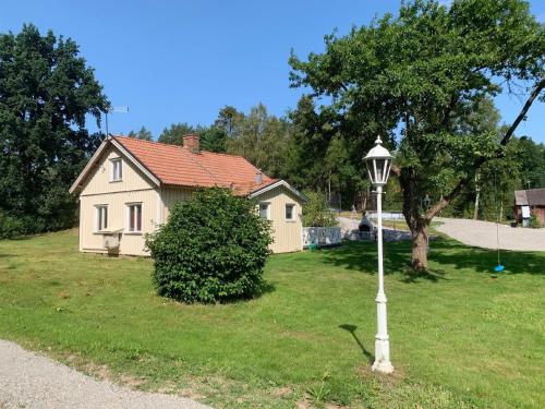 Vrt pred nastanitvijo Ferienhaus für 6 Personen ca 90 qm in Magra, Südschweden Västergötland