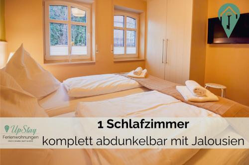Postel nebo postele na pokoji v ubytování Int Hörn 6 EG