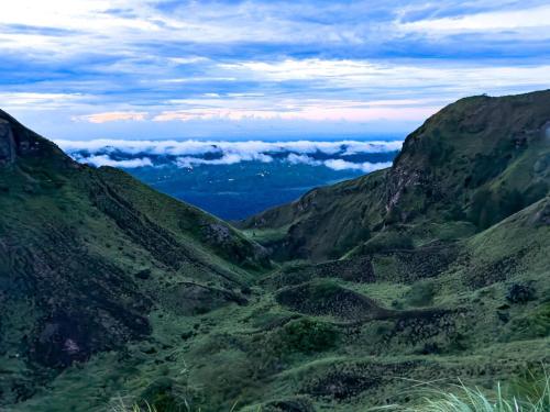 a view of a valley in the mountains at Villa Danu Kintamani in Kintamani