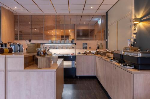 Kuchyň nebo kuchyňský kout v ubytování Fletcher Hotel-Restaurant Langewold