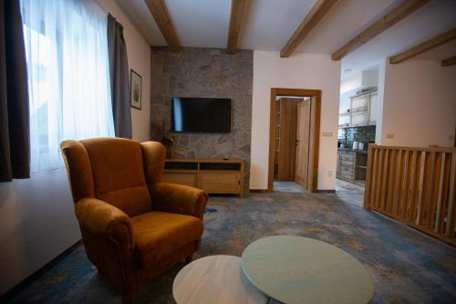 TV a/nebo společenská místnost v ubytování Apartmány Lúčny Raj