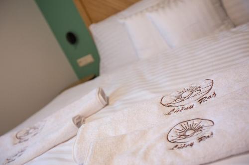 Postel nebo postele na pokoji v ubytování Apartmány Lúčny Raj