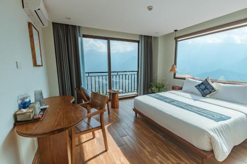 Postel nebo postele na pokoji v ubytování Sapa Yen Hotel