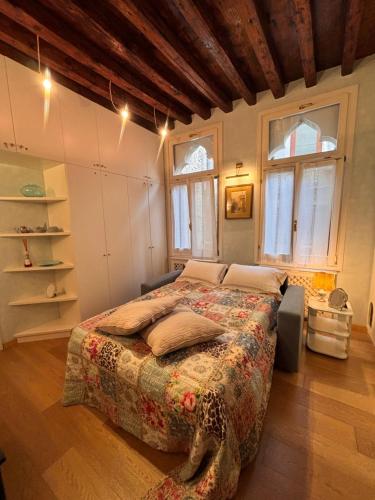 Postel nebo postele na pokoji v ubytování Albrizzi Charme apartment