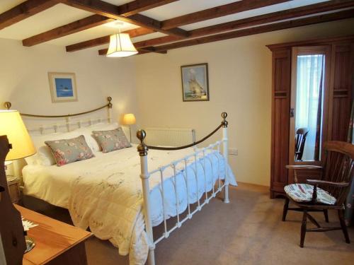 Voodi või voodid majutusasutuse The Cider Barn toas