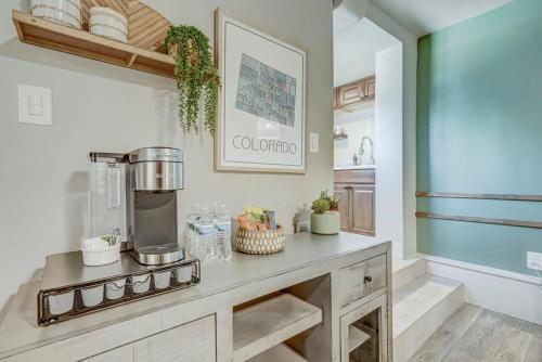 a kitchen with a counter with a coffee maker on it at Institute Bliss! Newly Remodeled Family Home! in Colorado Springs