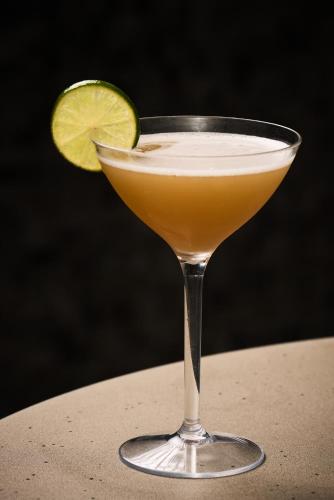 a margarita in a glass with a lime at InterContinental Barcelona by IHG in Barcelona