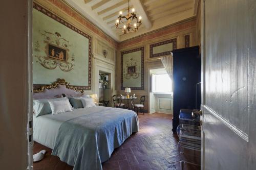 Postel nebo postele na pokoji v ubytování AdaeSaboCortona