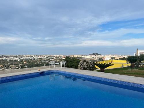 Casita "Zoo" con vistas al mar, al castillo de Denia, al Montgo y piscina comunitaria