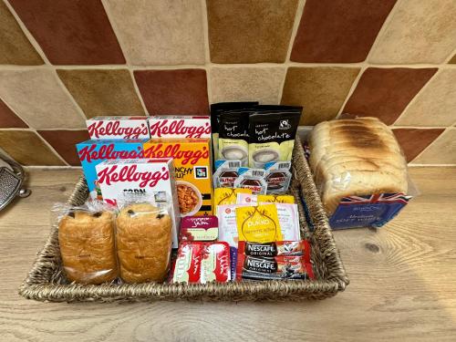 a basket with sandwiches and other food items on a counter at ElMurrs in Bournemouth