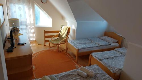 A bed or beds in a room at Apartmani MiM