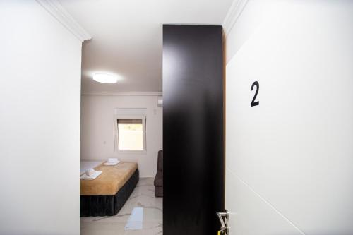 Cama o camas de una habitación en Apartmani Andric Budva
