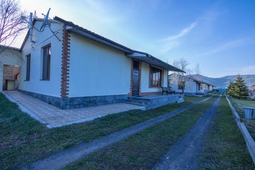 a house with a pathway leading up to it at Sevan Private Guest House in Sevan