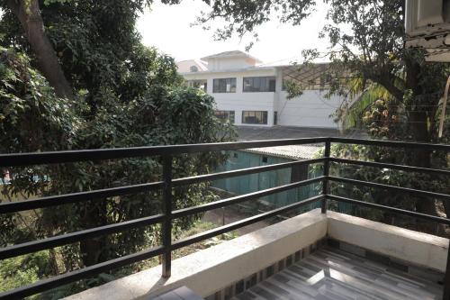 a view from the balcony of a house at Anant Villa & Resorts in Nagaon