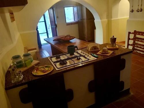 A kitchen or kitchenette at Case Rurali Pentedattilo