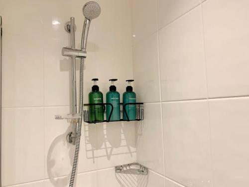 A bathroom at HNFC Stays - Ocean Central Newcastle Studio w/ Free parking + Gym