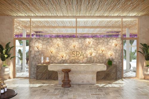 a rendering of a bathroom with a large stone tub at Salterra, a Luxury Collection Resort & Spa, Turks & Caicos  in Cockburn Harbour