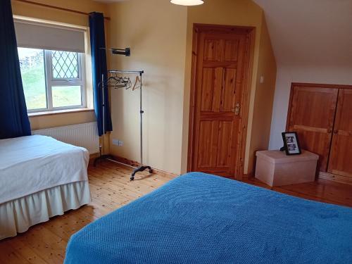 Ένα ή περισσότερα κρεβάτια σε δωμάτιο στο St Kieran's