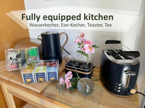 Kuchyň nebo kuchyňský kout v ubytování Amabello Apartment Colorful Art; 15-20 min von Basel, Bahnhof, Flughafen