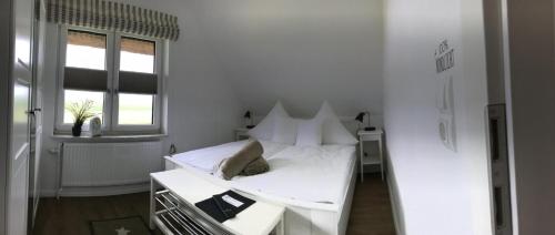 Ένα ή περισσότερα κρεβάτια σε δωμάτιο στο Diekkieker