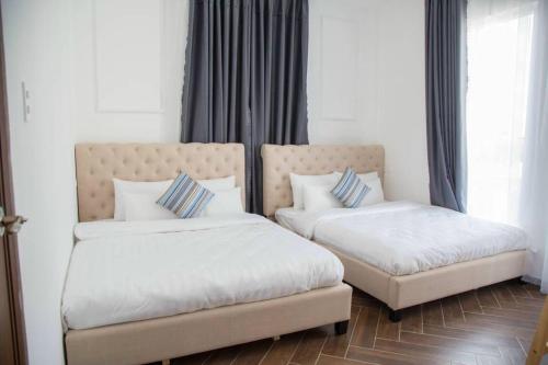 Postel nebo postele na pokoji v ubytování Căn hộ 2 phòng ngủ view đẹp gần trung tâm