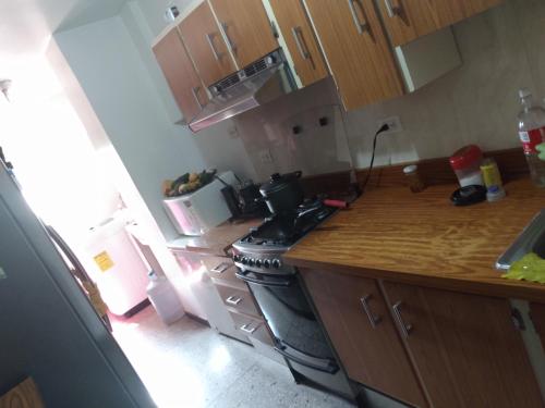 Kjøkken eller kjøkkenkrok på Habitación para una persona